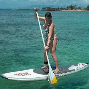 Anjulie Latta paddling in stand up paddleboarding in hawaii