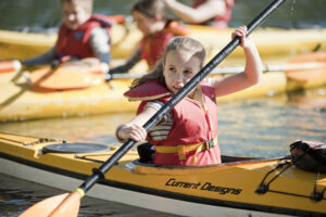 Kids Camps - girl paddling
