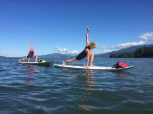 Kristy Wright teaches SUP Yoga