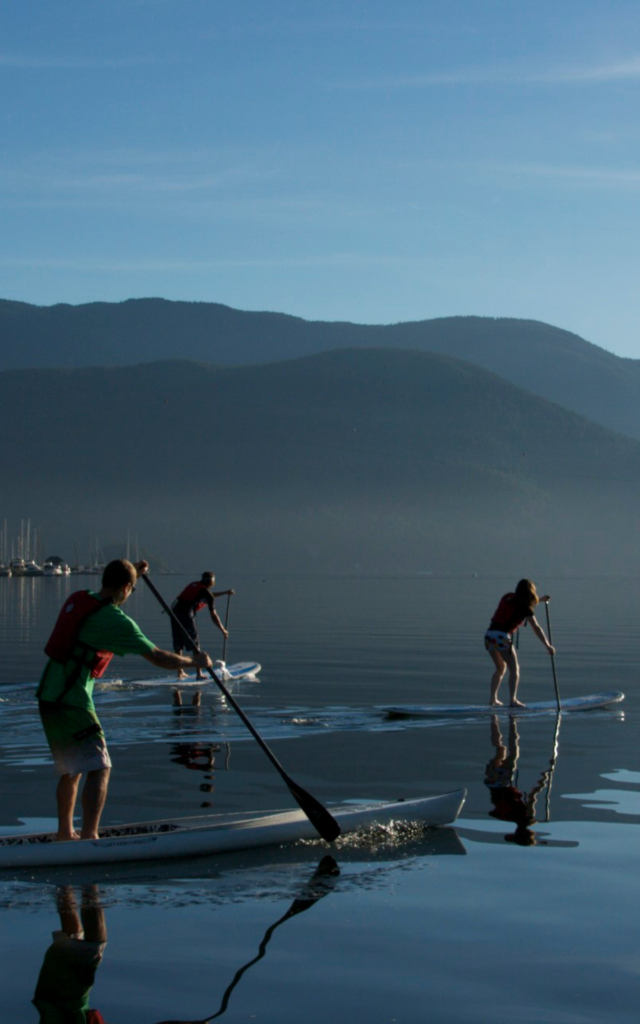 People on Stand up paddleboards at Deep Cove Kayak