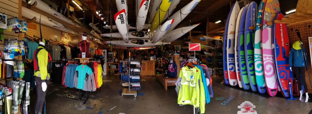 inside of a store showcasing summer paddling products